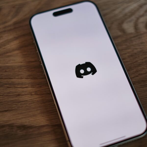 Mobile phone with the discord logo on it
