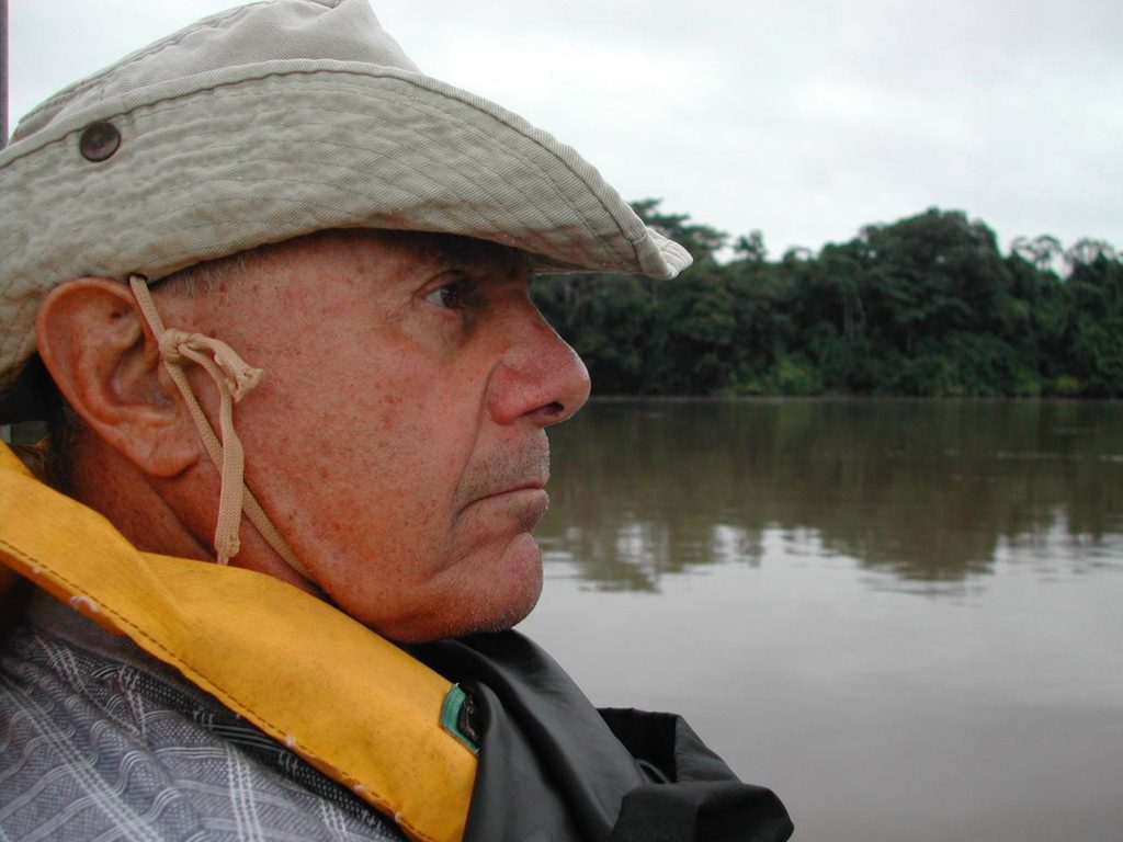 Headshot of Lou Appognani, on a boat in a river.